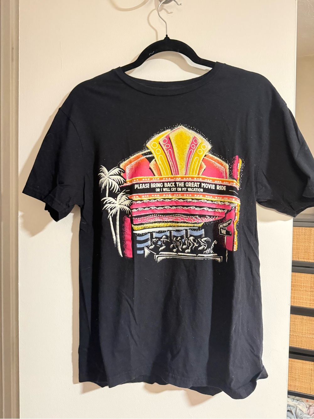 Great Movie Ride Black Short-Sleeve Graphic Tee with Neon Theater Illustration